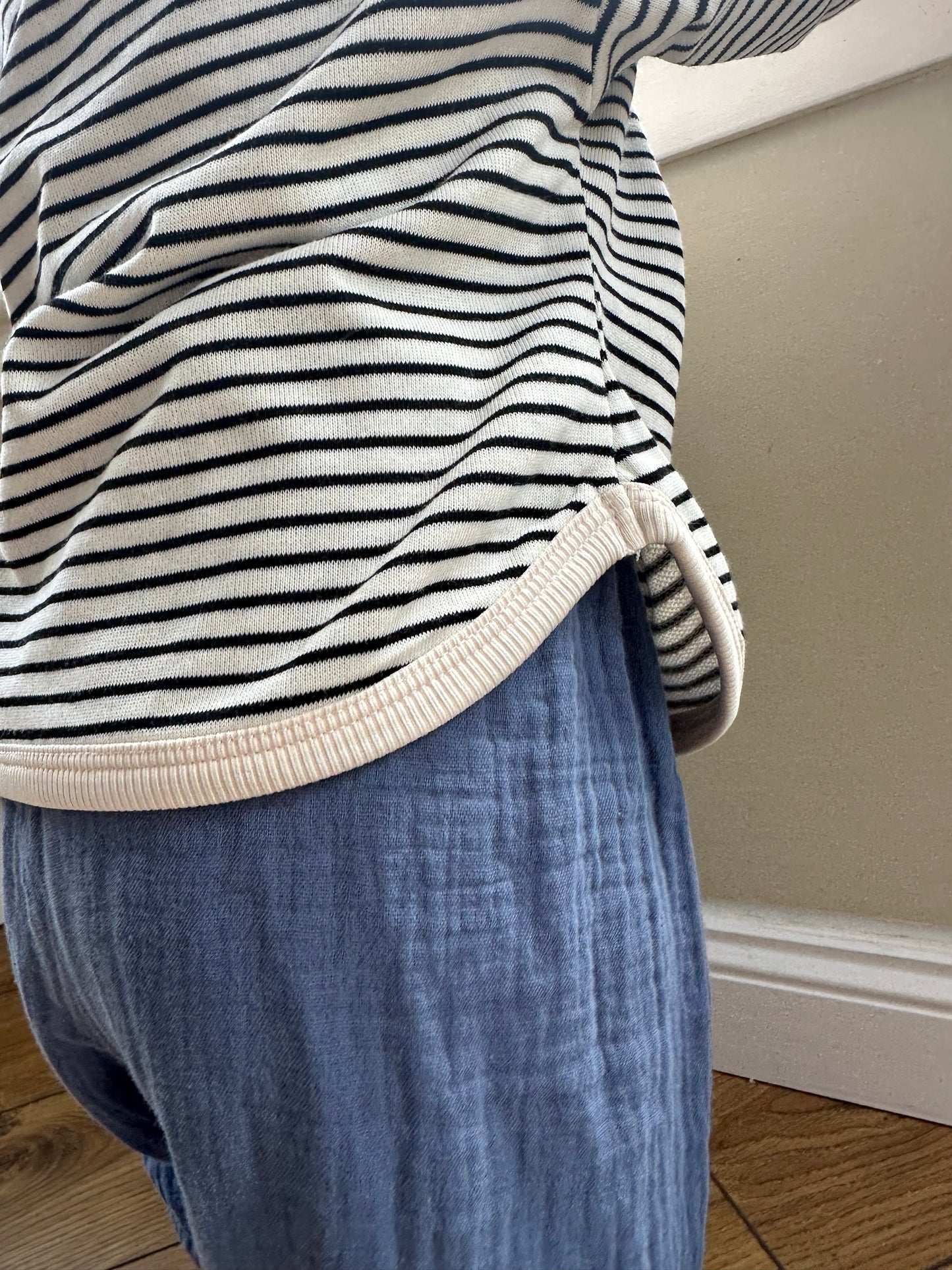 Lightweight breathable sweatshirt with cream/black stripes. Piping detail. Simple, classic style, korean style.